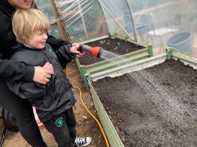 Class Four take a trip to Glenveagh to water the plants!