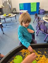 S1 have been enjoying messy play with Autumn and Halloween materials!